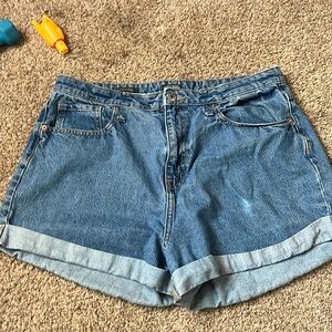 Blue shorts that say happy in the back